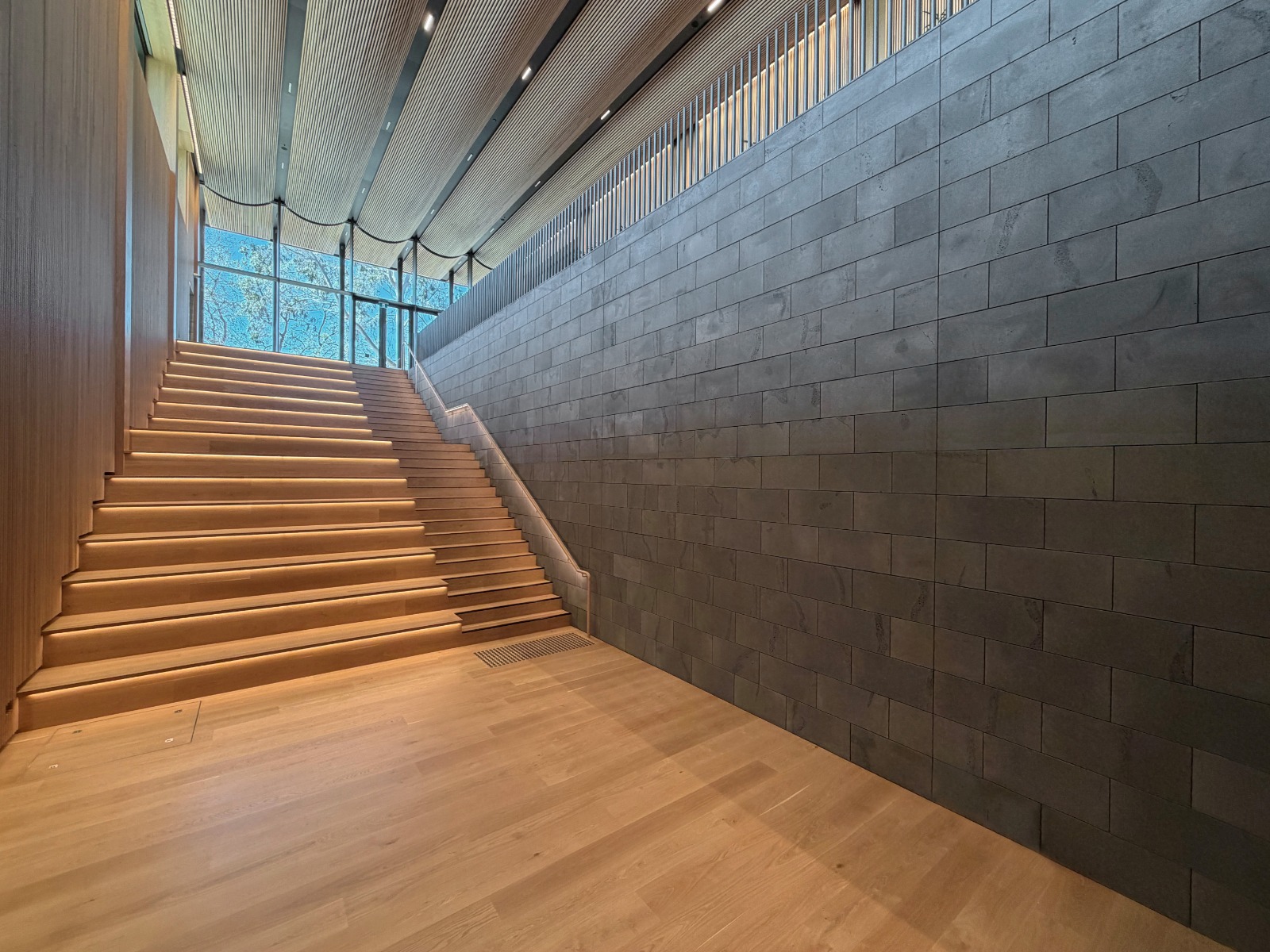 The Bluestone Wall running alongside a timber staircase